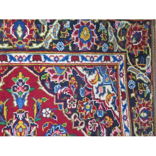 429 - A hand knotted woollen Kashan rug - 1.85m x 1.07m