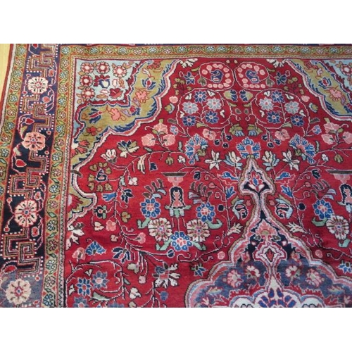 433 - A hand knotted woollen Kashan rug - 2.20m x 1.30m