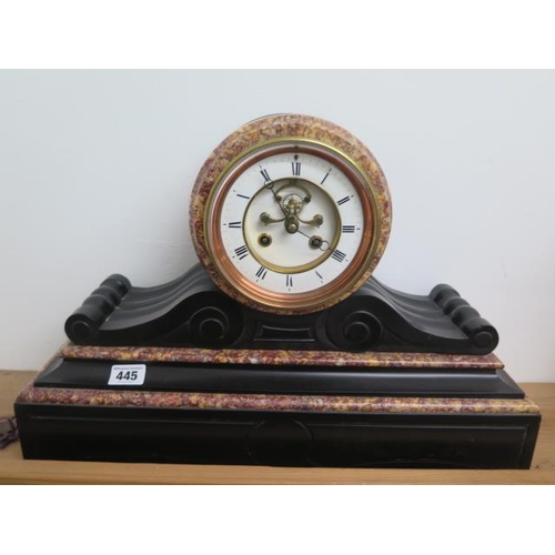 445 - An antique black and red variegated marble 8 day mantle clock, visible Brocot escapement and enamell... 