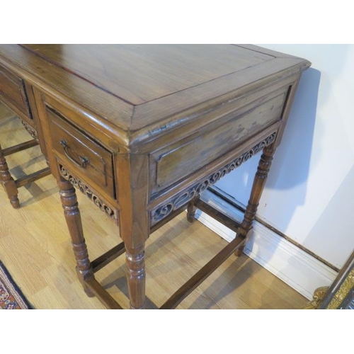 461 - An unusual Chinese hardwood freestanding three drawer side table on turned supports in three parts, ... 