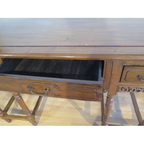 461 - An unusual Chinese hardwood freestanding three drawer side table on turned supports in three parts, ... 