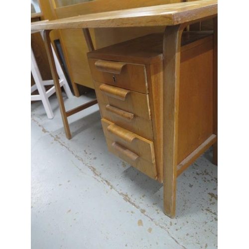 463 - An oak retro four drawer desk - Height 70cm x 99cm x 44cm