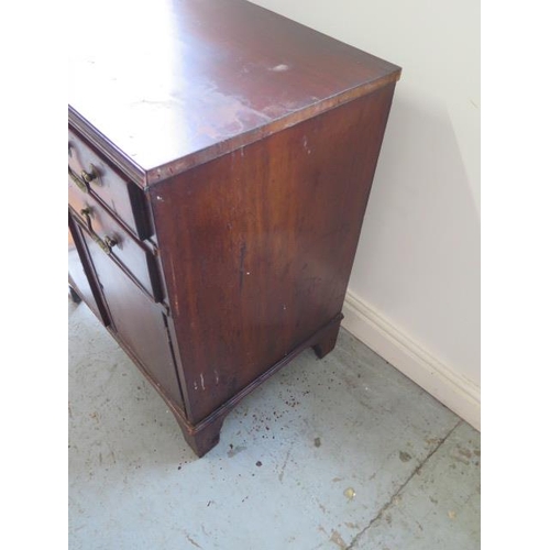 515 - A mahogany cabinet with two drawers above two cupboard doors - Height 75cm x 64cm x 46cm