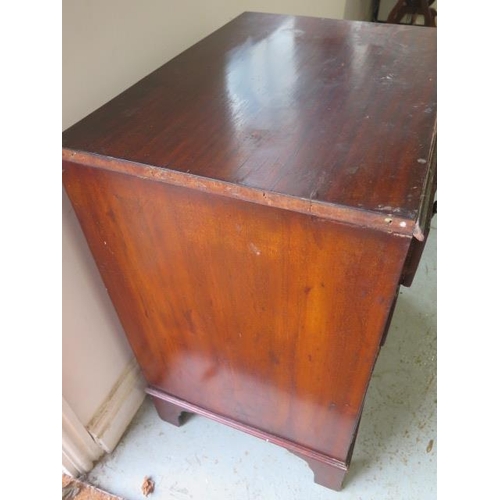 515 - A mahogany cabinet with two drawers above two cupboard doors - Height 75cm x 64cm x 46cm