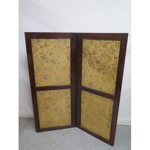 519 - A Victorian mahogany two section folding upholstered vanity screen - Height 145cm x Width 124cm