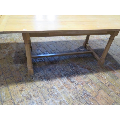 515 - A Neptune light oak draw leaf refectory style dining table on turned supports - Height 75cm x Width ... 