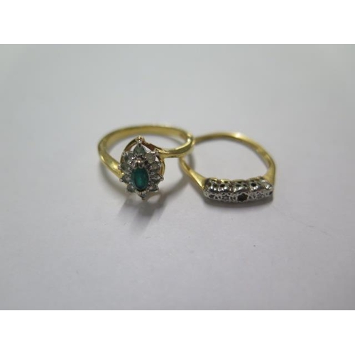 74 - An 18ct yellow gold rings size M  approx weight 2.2 grams ,there are three stones missing , and a gi... 