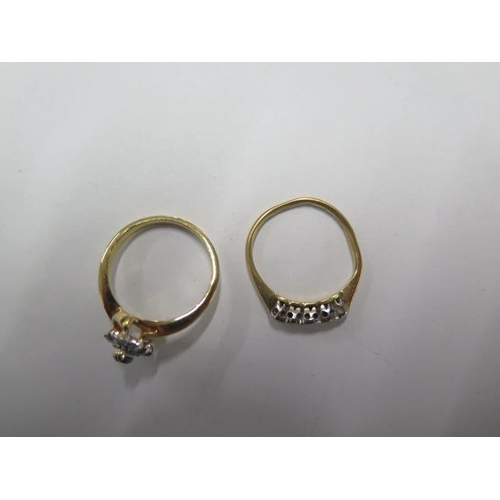 74 - An 18ct yellow gold rings size M  approx weight 2.2 grams ,there are three stones missing , and a gi... 