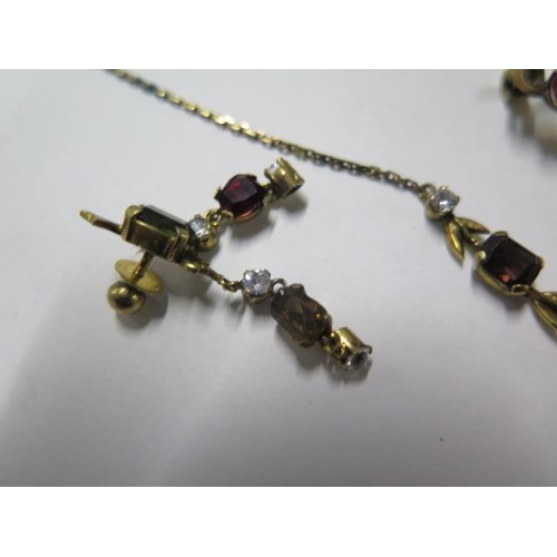 75 - A pretty yellow gold multi stone necklace, 43cm long, a pair of matching earrings and a multi stone ... 