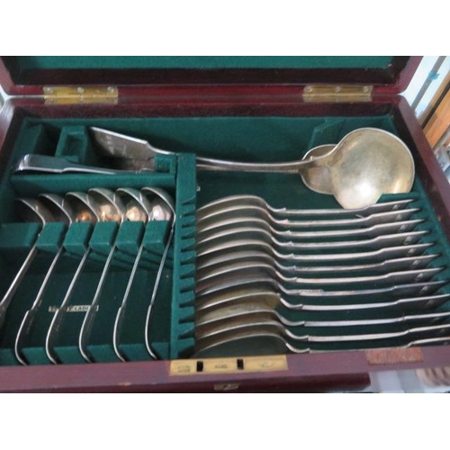 106 - A canteen of assorted plated cutlery, a silver caddy spoon and silver mustard spoon - approx total w... 