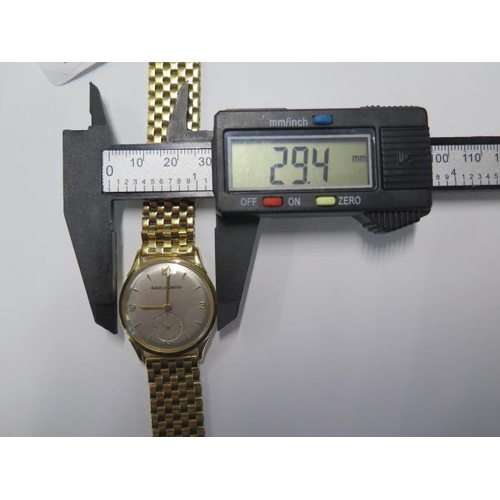 141 - An 18ct yellow gold Jaeger-Le Coultre manual wind wristwatch on an 18ct yellow gold bracelet strap -... 