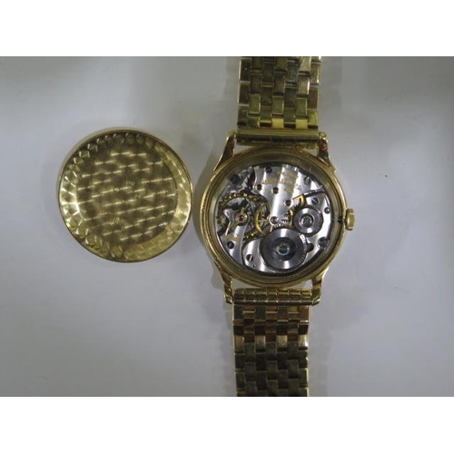 141 - An 18ct yellow gold Jaeger-Le Coultre manual wind wristwatch on an 18ct yellow gold bracelet strap -... 