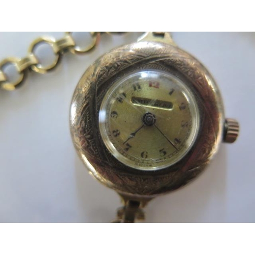 150 - An Elgin top wind pocket watch on a plated strap - 44mm case - running, some hairlines to dial and a... 