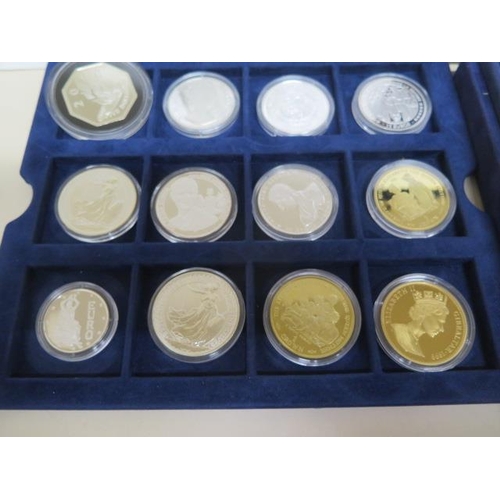 184 - A collection of 27 silver coins to include five gold clad Queen Mother coins, two Britinnia's approx... 