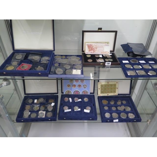 186 - A collection of assorted proof coins and bank notes