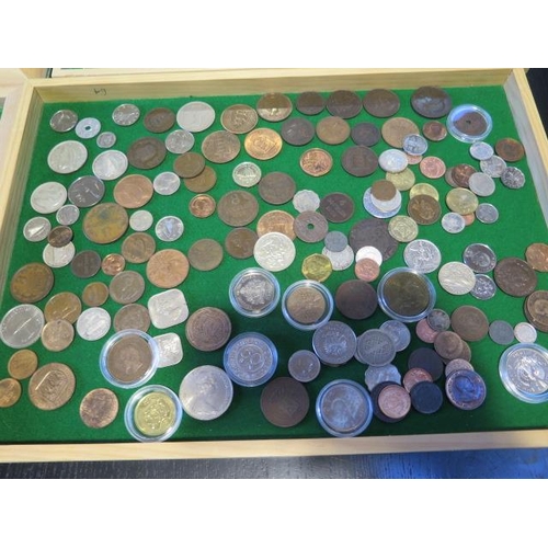 196 - Six trays of World coins