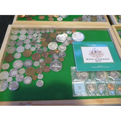 196 - Six trays of World coins