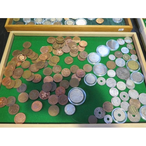 196 - Six trays of World coins