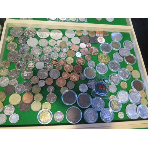 196 - Six trays of World coins