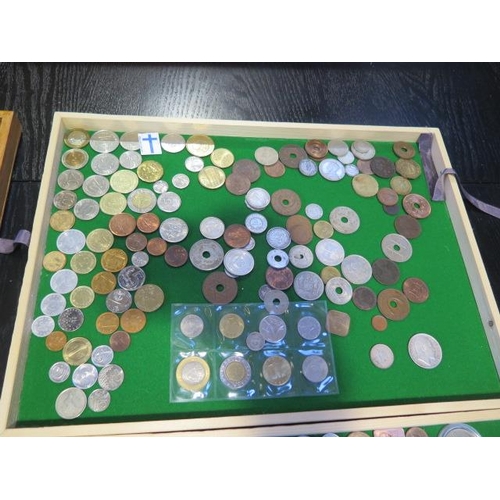 196 - Six trays of World coins