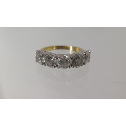 An 18ct yellow gold five stone diamond ring, each stone approx 0.70ct, approx 5.8mm x 3.6mm - ring size M -approx weight 6.9 grams - diamonds bright