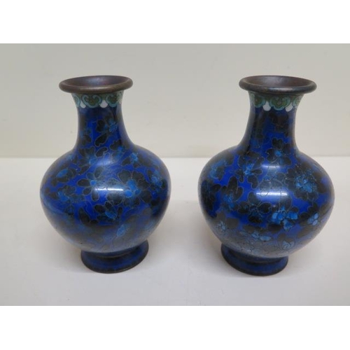 217 - A pair of cloisonné enamel vases - Height 15cm - both generally good