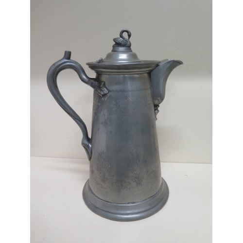 244 - A large Pewter type metal lidded beer/water jug - Height 33cm - denting to base otherwise reasonably... 