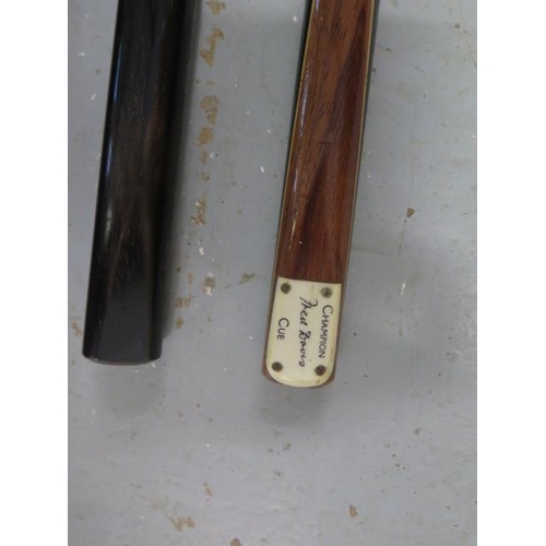 246 - A Fred Davis 17 1/2oz Champion snooker cue and a 17oz cue - both with metal cases