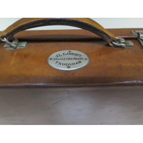 247 - A good quality early 20th century leather attache/travel case by Finnigans Ltd Manchester with a pla... 