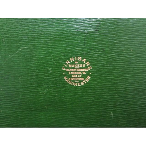 247 - A good quality early 20th century leather attache/travel case by Finnigans Ltd Manchester with a pla... 