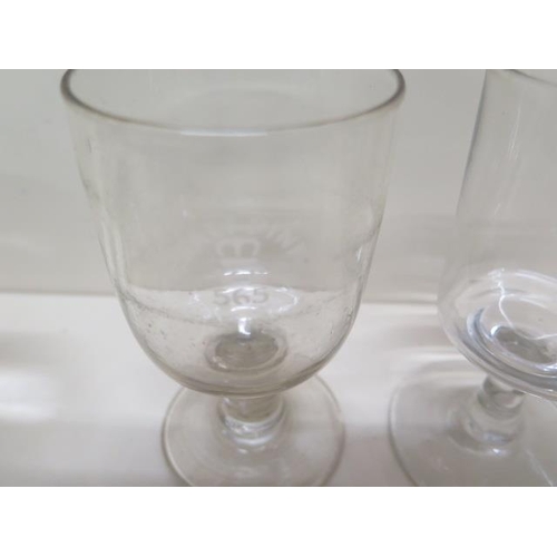 261 - A pair of 19th century bell shaped wine glasses, a Victorian 1/2 pint rummer, two other 19th century... 