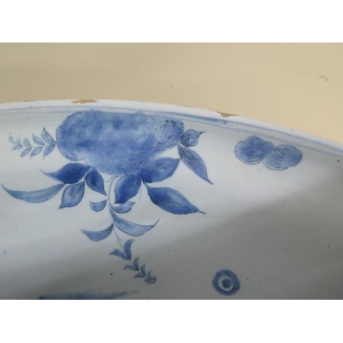 267 - A large Delft blue and white bowl decorated with ships, villas and fruit - Height 20cm x Diameter 44... 