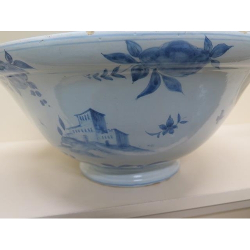 267 - A large Delft blue and white bowl decorated with ships, villas and fruit - Height 20cm x Diameter 44... 