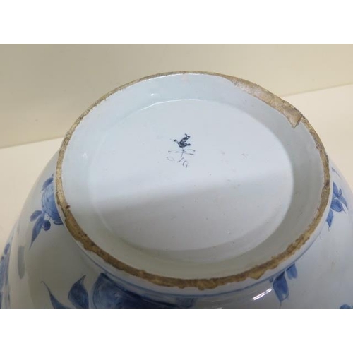 267 - A large Delft blue and white bowl decorated with ships, villas and fruit - Height 20cm x Diameter 44... 