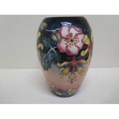 269 - A Moorcroft green initialled vase - Height 18cm - good condition