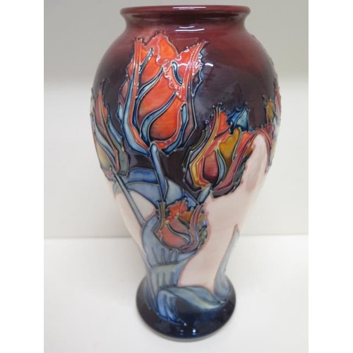 279 - A Moorcroft red tulip vase - Height 31cm - in good condition, some crazing mainly to base