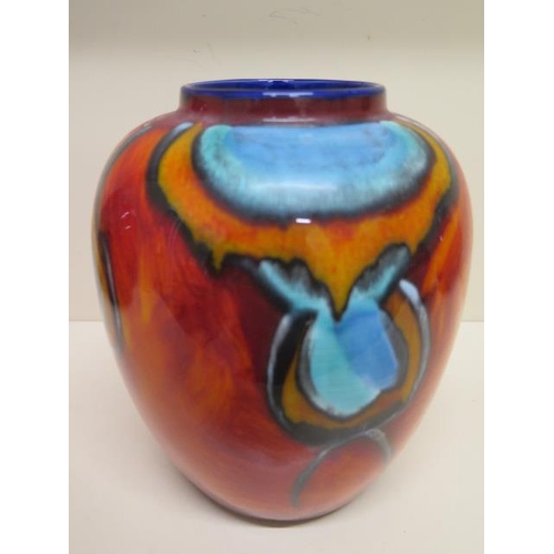 282 - A Poole Peacock vase - Height 22cm - good condition