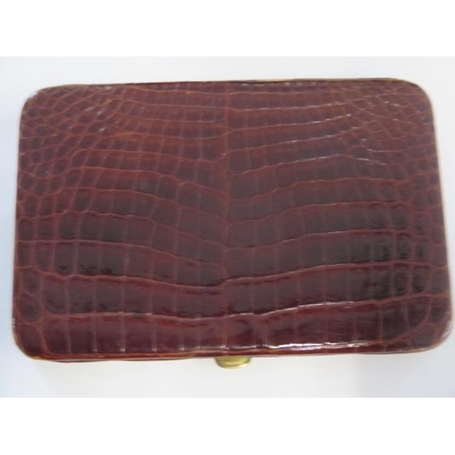 285 - A vintage crocodile skin cigarette/card case - 13cm x 9cm - generally good