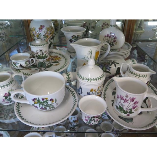 287 - A good collection of Portmeirion Botanic garden table ware including a large bread crock, jugs, vase... 