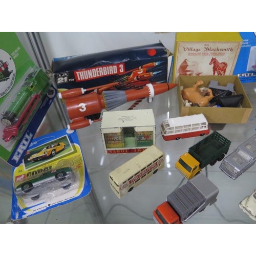 304 - A collection of Diecast and other vehicles including Lesney, Thomas The Tank and some Airfix Romans