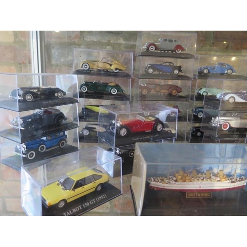 306 - A collection of 53 Diecast classic cars all in display boxes and a Liner Britannic