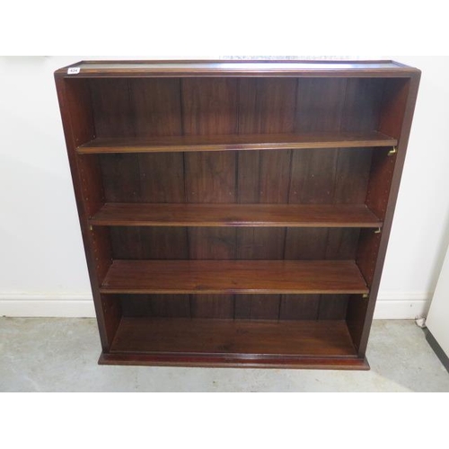 434 - A bookcase with adjustable shelves - Height 106cm x Width 99cm x 22cm