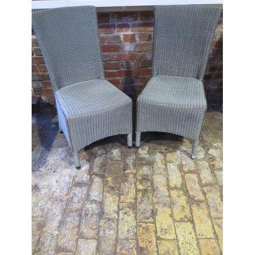 440 - A pair of modern Lloyd Loom Neptune Havana side chairs - Height 95cm some usage wear - retail price ... 