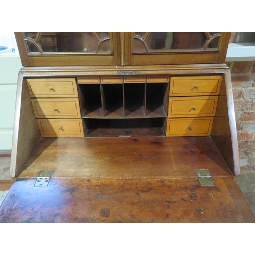 442 - An Edwardian mahogany bureau bookcase of small proportions - Height 196cm x Width 71cm x Depth 47cm