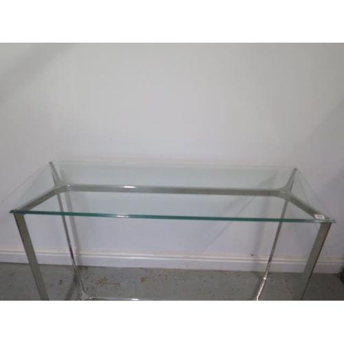 444 - A chrome and glass side/hall table - Height 81cm x 120cm x 40cm