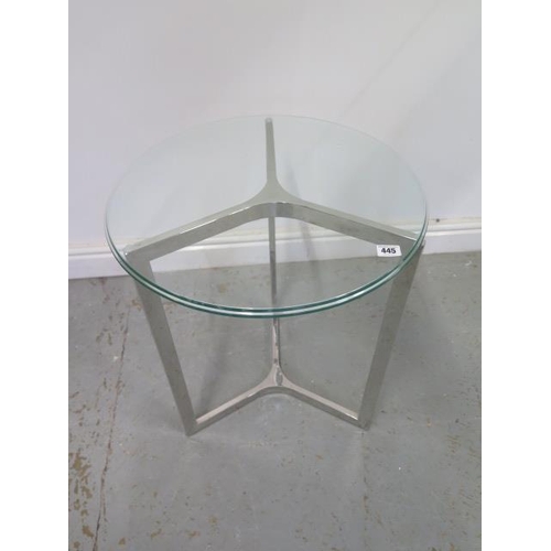 445 - A chrome and glass circular side table - Height 61cm x 50cm
