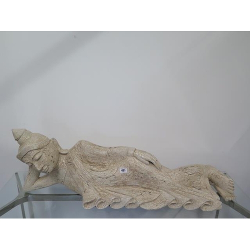 451 - An Eastern carved wooden reclining painted figure - Length 100cm