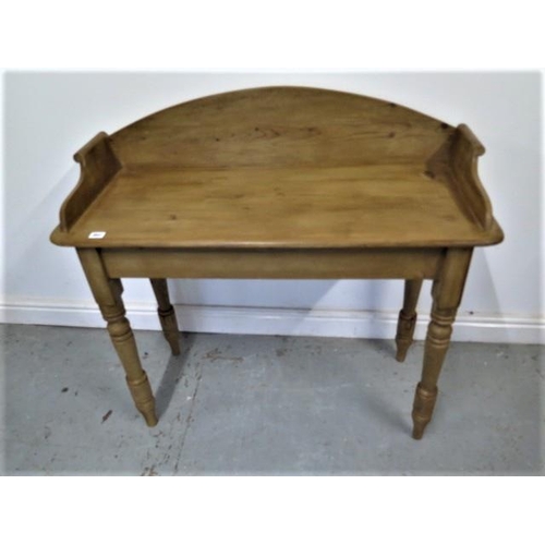 453 - A Victorian waxed pine washstand on turned legs with good colour - Height 92cm x 98cm x 40cm