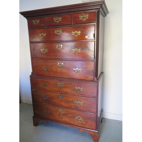 520 - A Georgian mahogany chest on chest with three small drawers over six long graduating drawers on brac... 