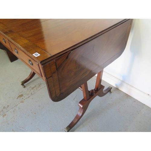 525 - A late 19th century mahogany drop leaf sofa stretcher table with two active and two dummy drawers on... 